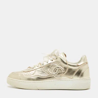 Pre-owned Chanel Gold Leather Cc Low Top Sneakers Size 37