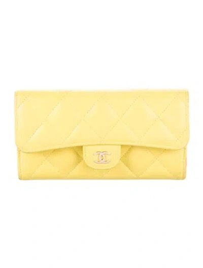 Pre-owned Chanel Interlocking Cc Logo Trifold Wallet In Yellow