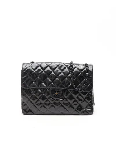 Chanel Jumbo Patent Single Flap Bag In Black