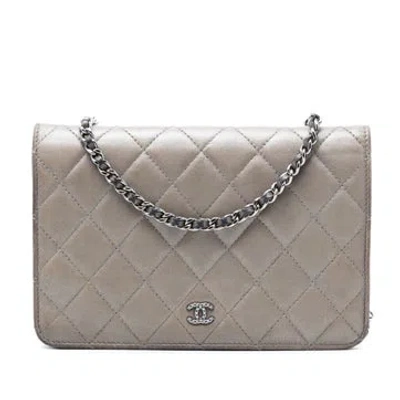 Pre-owned Chanel Lambskin Cc Quilted Lambskin Full Flap Wallet On Chain In Brown