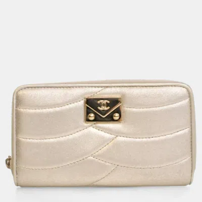 Pre-owned Chanel Lambskin Cc Zip Wallet In Gold