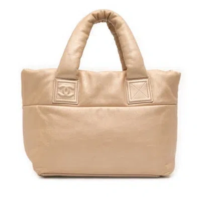 Pre-owned Chanel Lambskin Small Lambskin Coco Cocoon Reversible Tote In Gold