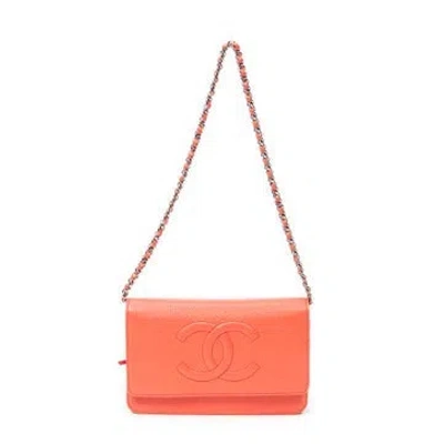 Pre-owned Chanel Leather Timeless Cc Wallet On Chain In Orange