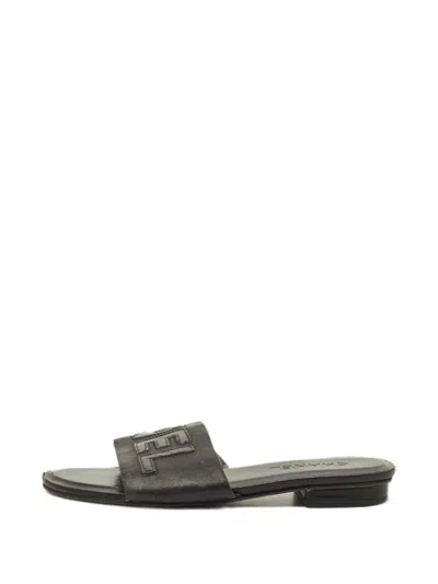 Pre-owned Chanel Logo Leather Slides In Black