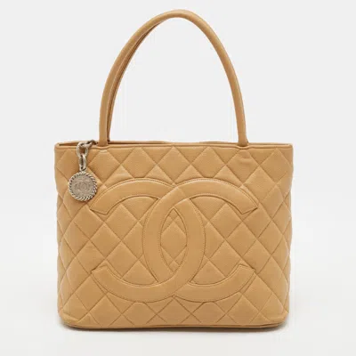 Pre-owned Chanel Medallion Tan Quilted Caviar Leather Tote In Brown