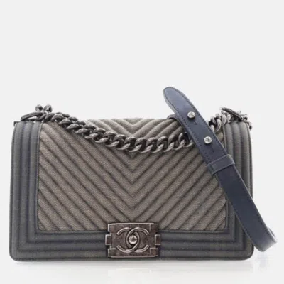 Pre-owned Chanel Medium Blue Chevron Denim Boy Bag