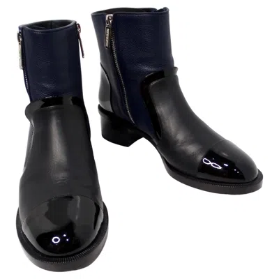 Pre-owned Chanel Navy Blue & Black Leather Interlocking Cc Logo Ankle Boots