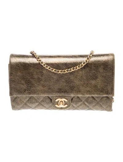Pre-owned Chanel Paris-cosmopolite Zip Away Chain Clutch In Gold/metallic