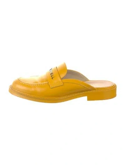 Pre-owned Chanel Pharrell Leather Mules In Yellow