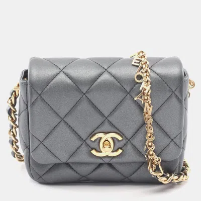 Pre-owned Chanel Quilted Metallic Lambskin Logo Charm Chain Flap Mini Gray Crossbody Bag