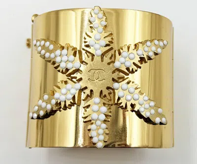 Pre-owned Chanel Rare Vintage Gold Plated Cc White Bead Snowflake Cuff Bracelet