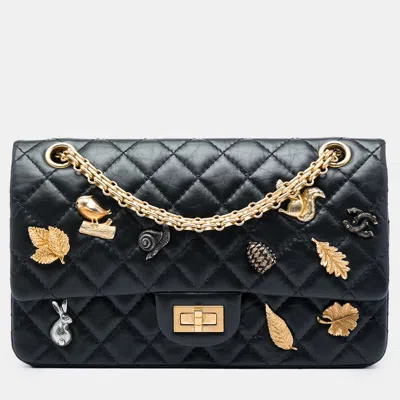 Pre-owned Chanel Reissue 2.55 225 Lucky Charms Quilted Aged Calfskin Leather Double Flap Bag In Black