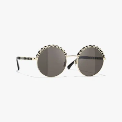 Chanel Round Sunglasses In Gold & Black 
