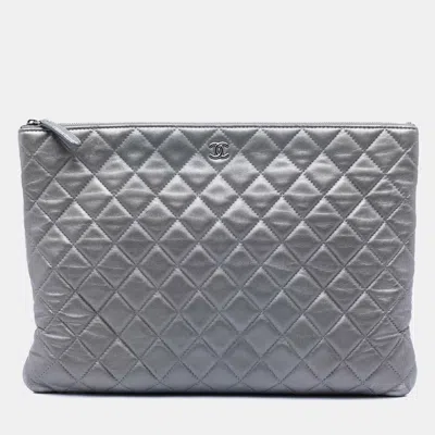Pre-owned Chanel Silver Large Quilted Metallic Lambskin O Case Clutch