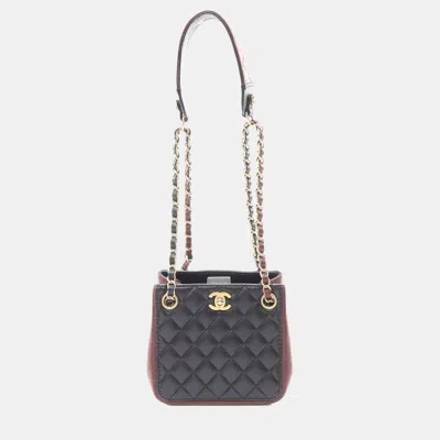 Pre-owned Chanel Strap Into Black/burgundy Quilted Lambskin Leather Bucket Bag