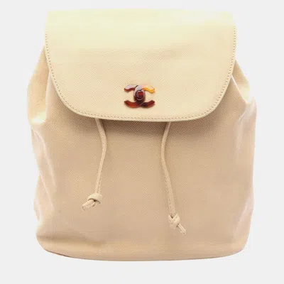 Pre-owned Chanel Triple Coco Mark Grained Calfskin Leather Backpack Bag In Beige