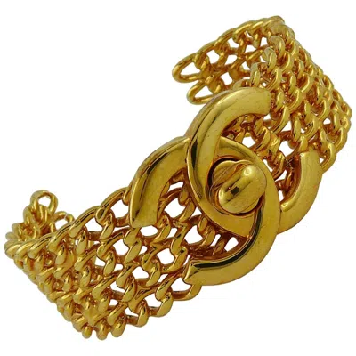 Pre-owned Chanel Vintage 1997 Cc Turnlock And Chains Gold Toned Cuff Bracelet In Brown