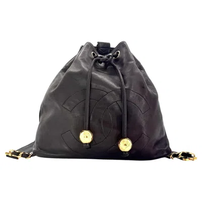Pre-owned Chanel Vintage Black Lambskin Timeless Cc Drawstring Backpack Gold Hardware