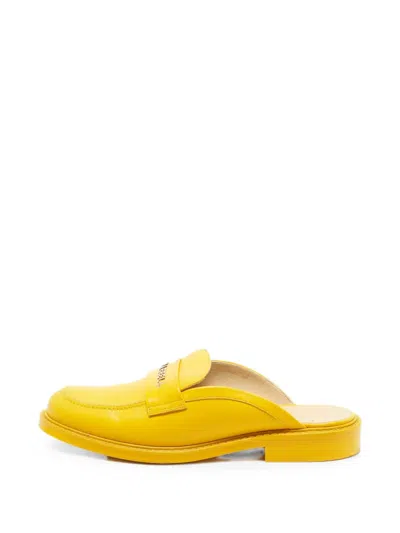 Pre-owned Chanel X Pharrell Logo-lettering Mules In Yellow