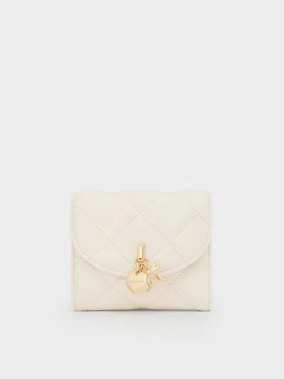 Charles & Keith - Arrietty Quilted Bow-heart Charm Curved-flap Wallet In White