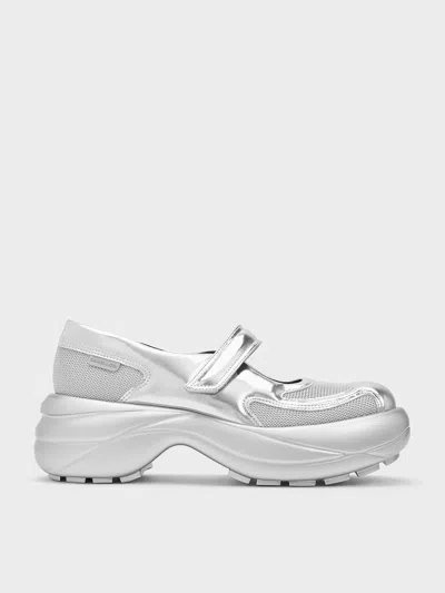 Charles & Keith Metallic Curved Platform Mary Janes In Silver