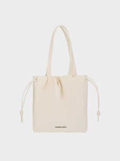 Charles & Keith - Mini Bethel Crinkle-effect Ruched Drawstring Tote Bag In Cream
