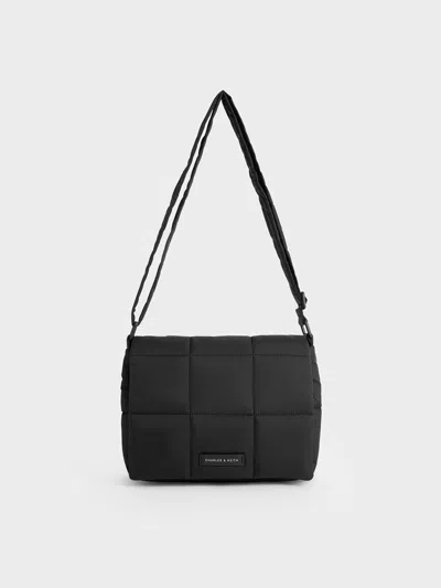 Charles & Keith - Mini Errya Nylon Quilted Puffy Crossbody Bag In Jet Black