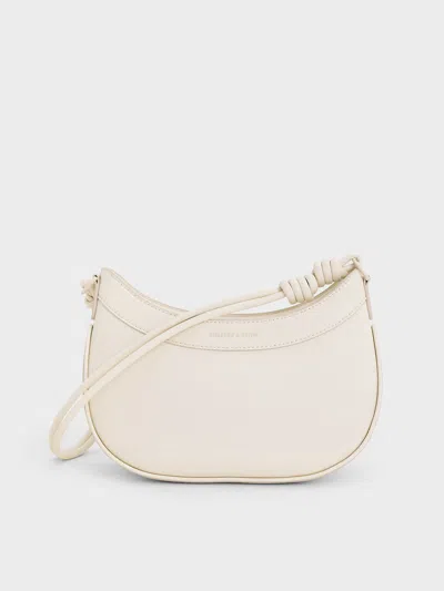 Charles & Keith - Sabine Knotted-strap Curved Shoulder Bag In Cream
