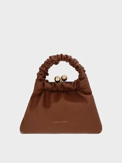 Charles & Keith Eve Ruched-handle Trapeze Bag In Chocolate