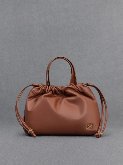 Charles & Keith Leather Ruched Drawstring Bag In Cognac