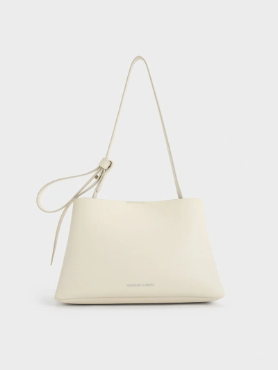 Charles & Keith Odella Trapeze Bucket Bag In Neutral