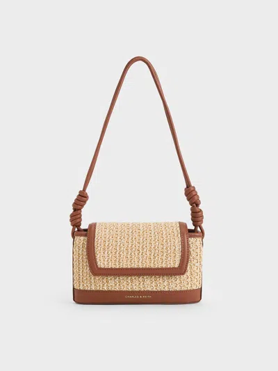 Charles & Keith Sabine Raffia Knotted-strap Bag In Brown