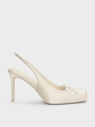 - Satin Ruched Stiletto Slingback Pumps In Neutral from Charles & Keith