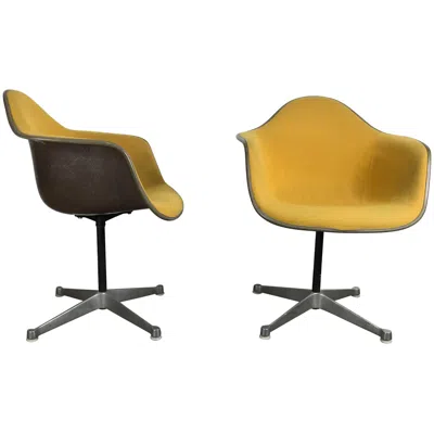Pre-owned Charles And Ray Eames Pair Of  Swivel Padded Arm Shell Chairs, Two-tone In Brown