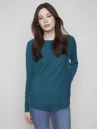 Charlie B Round Hem Sweater With Front Pockets In Evergreen In Green