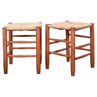 Pre-owned Charlotte Perriand A Rare Pair Of “bauche” Rush Stools, Attributed To  In Brown
