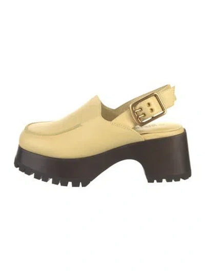 Pre-owned Charlotte Stone Leather Slingback Pumps In Yellow