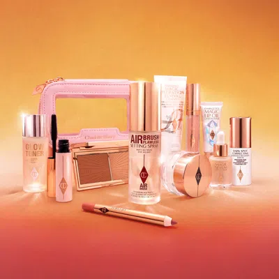 Charlotte Tilbury Charlotte's Mini Glow + Go Travel Beauty Bag - Over 50% Off In Transparent
