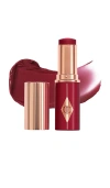 Charlotte Tilbury Unreal Lip + Cheek Glow Blush Stick With Hyaluronic Acid Berry Glow 0.31 Oz/9 ml In Purple