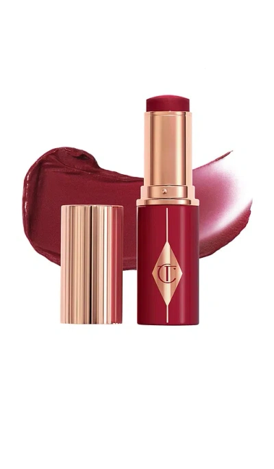 CHARLOTTE TILBURY UNREAL LIP + CHEEK GLOW BLUSH STICK WITH HYALURONIC ACID