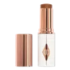 Charlotte Tilbury Unreal Skin Sheer Glow Tint Hydrating Foundation Stick - 14 Deep