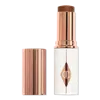 Charlotte Tilbury Unreal Skin Sheer Glow Tint Hydrating Foundation Stick - 15 Deep