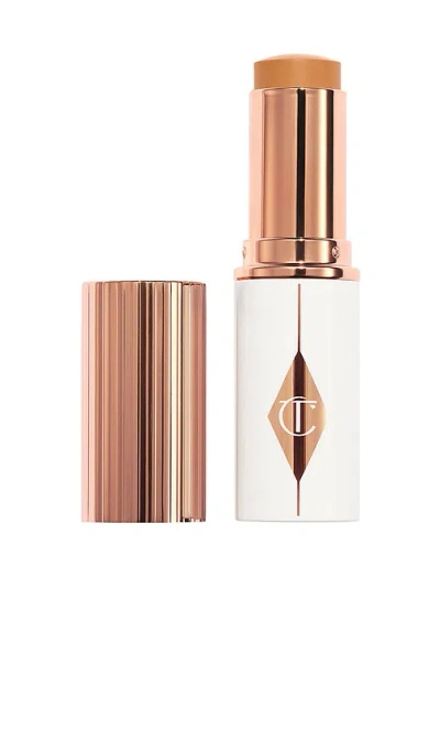 Charlotte Tilbury Unreal Skin Sheer Glow Tint Hydrating Foundation Stick In 10 Tan