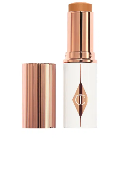 Charlotte Tilbury Unreal Skin Sheer Glow Tint Hydrating Foundation Stick In 12 Tan