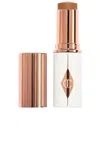 Charlotte Tilbury Unreal Skin Sheer Glow Tint Hydrating Foundation Stick In 12.5 Tan