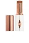 Charlotte Tilbury Unreal Skin Sheer Glow Tint Hydrating Foundation Stick In 14 Deep