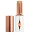 Charlotte Tilbury Unreal Skin Sheer Glow Tint Hydrating Foundation Stick In 5 Medium