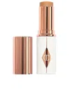 Charlotte Tilbury Unreal Skin Sheer Glow Tint Hydrating Foundation Stick In 9 Tan