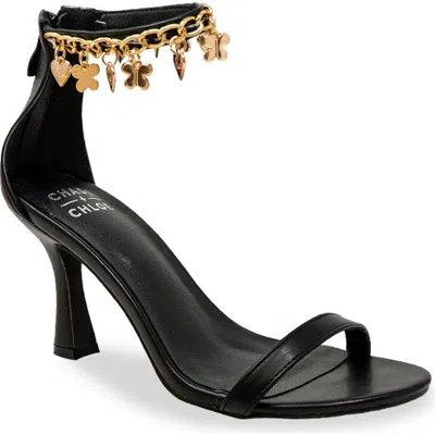 Chase & Chloe Chase And Chloe Iridessa Charm Ankle Strap Sandal In Black