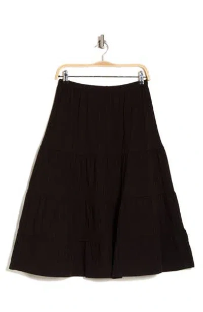 Chelsea And Theodore Tiered Midi Skirt In Black